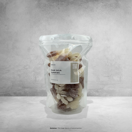 A clear plastic pouch containing sour cola gummies candies, with a label reading 'SOUR COLA GUMMIES'.