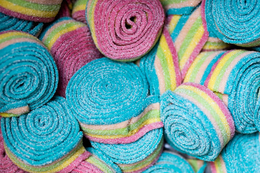 Stack of gummy candy rainbow rolls